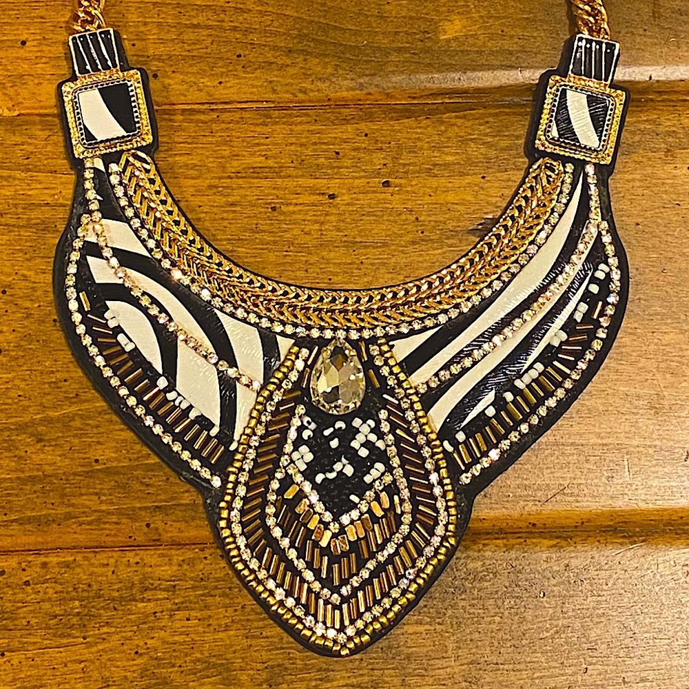 Zebra print jeweled and gold beaded bib necklace